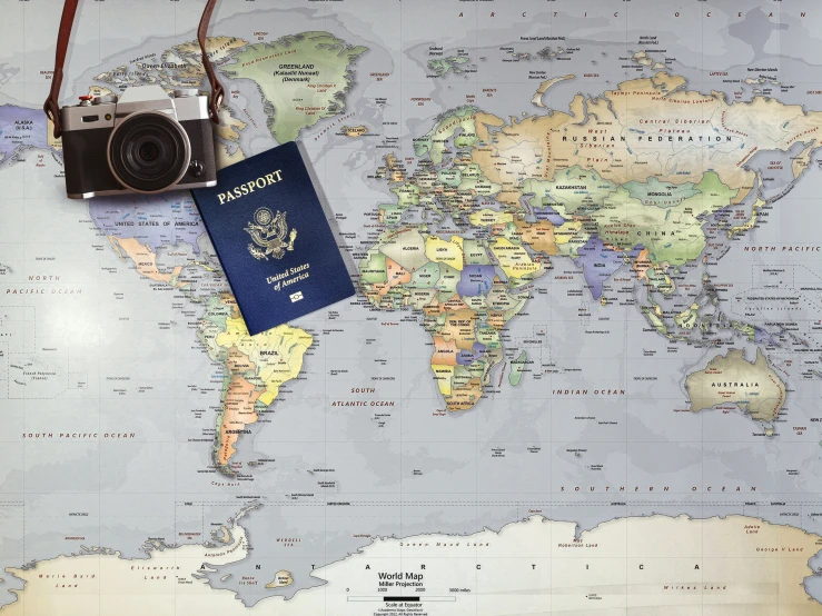 a map and camera are sitting on a table