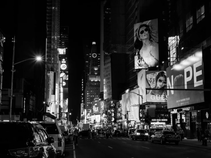 a view of times square in new york city at night