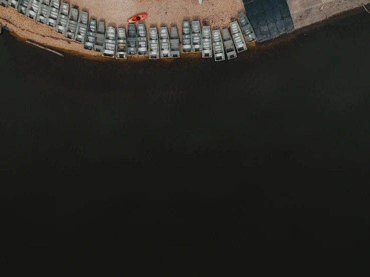 an aerial view of vehicles parked in a parking lot