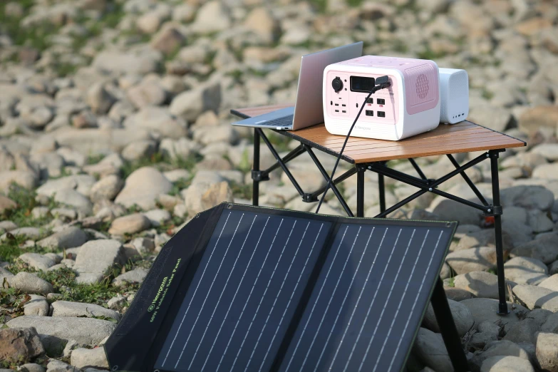 a microwave sitting on a table on a pile of rocks