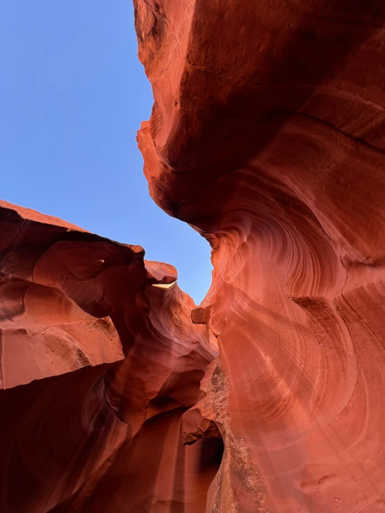 a view of the rocks and sky in a canyon