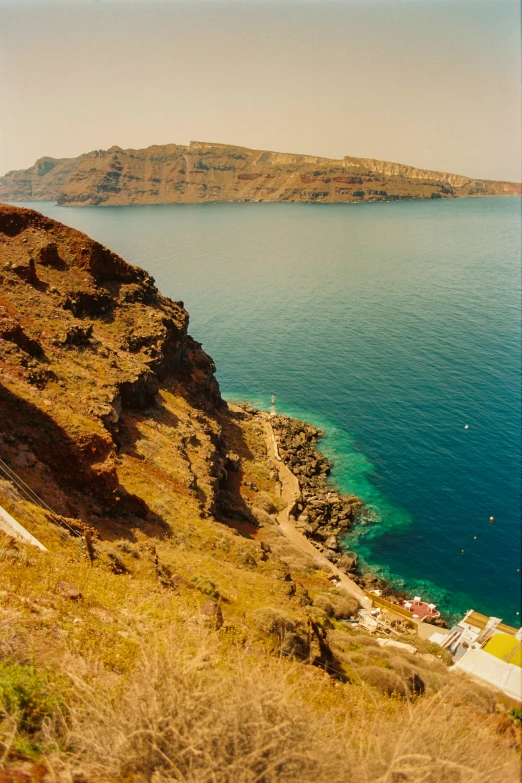 a beautiful lake and small island in the distance