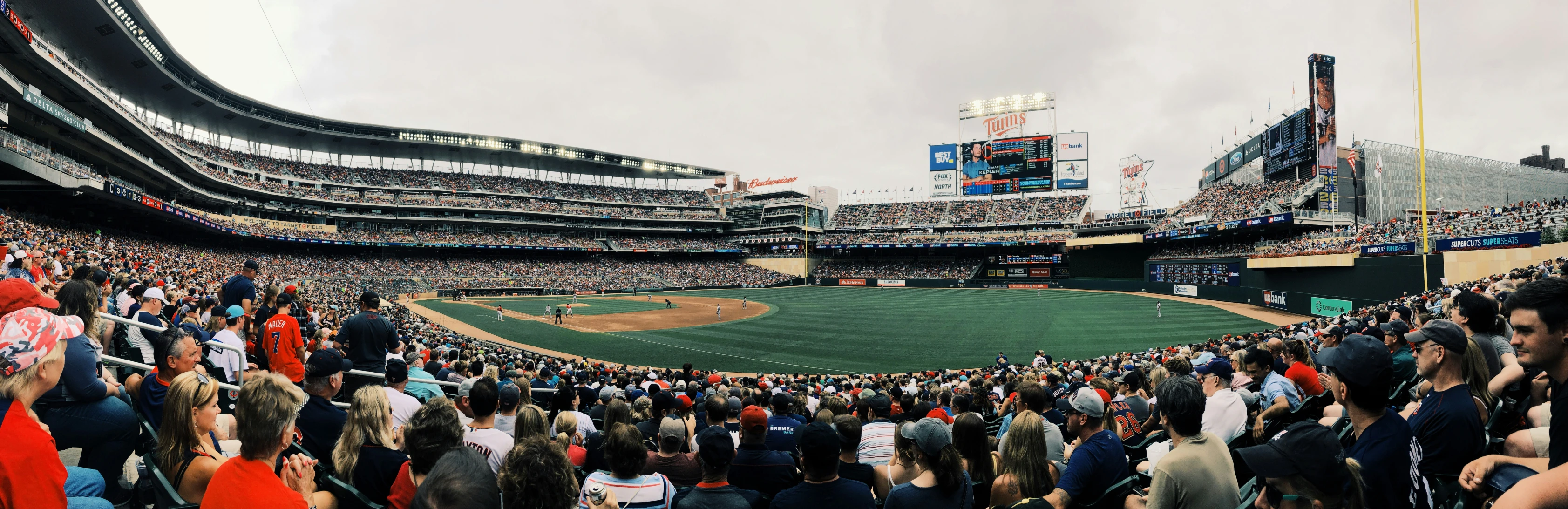 a huge baseball stadium full of spectators