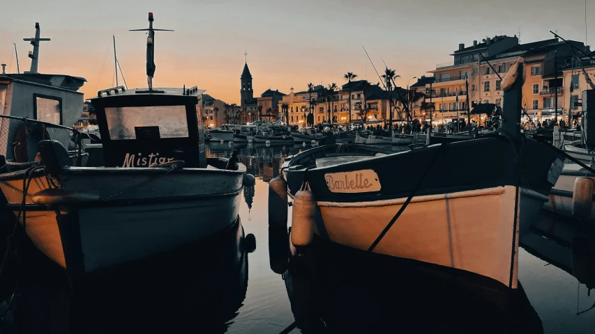 a couple of boats that are sitting in the water