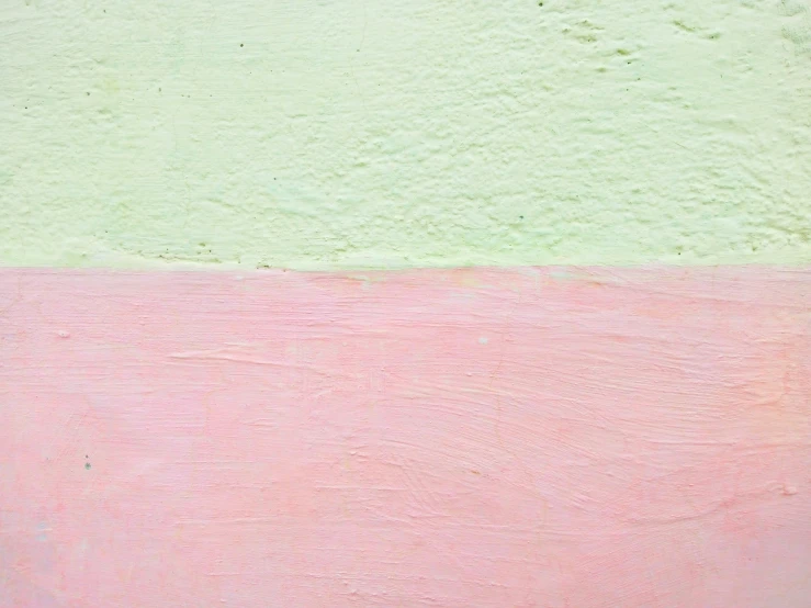 an abstract painting of different colors on a wall