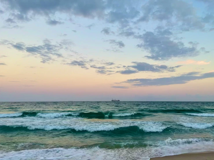 the ocean is beautiful with blue green waves