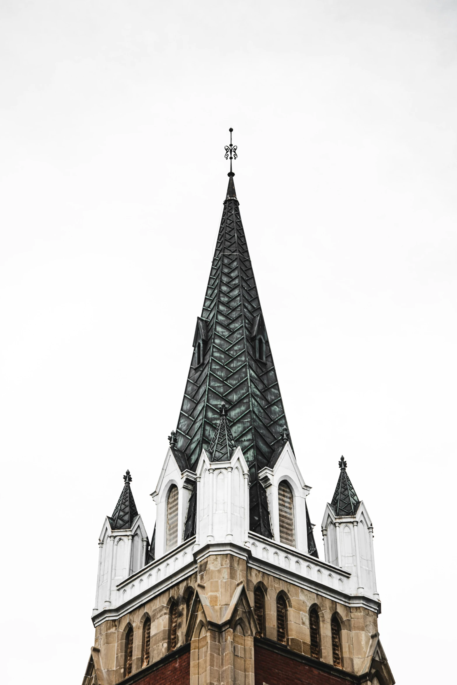 a very large building with a tower that has two clocks on it