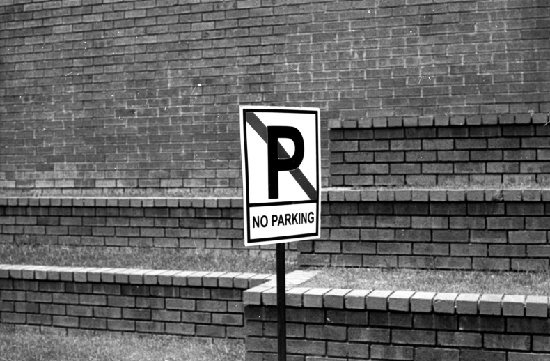 an image of a no parking sign in black and white