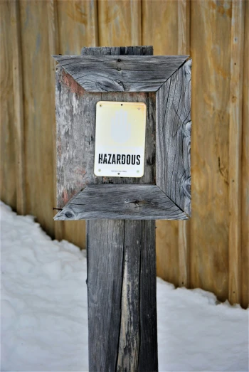 an old wood box that is showing hazardous hazard