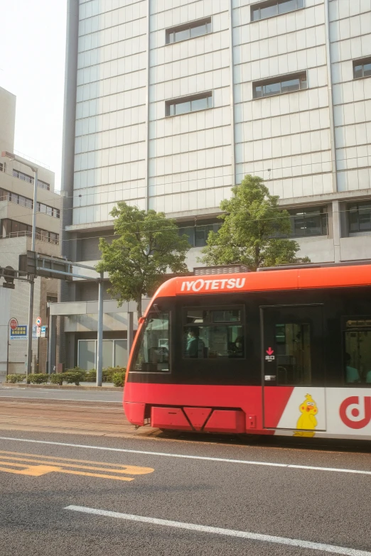 red and white metro bus riding down the street