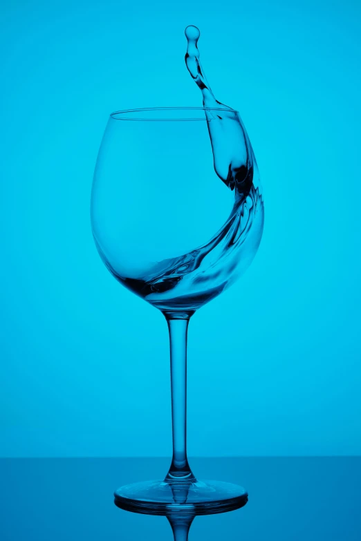 an image of a wine glass being filled