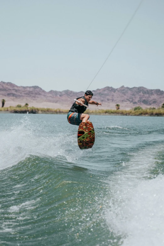 a person is riding the waves on a surfboard