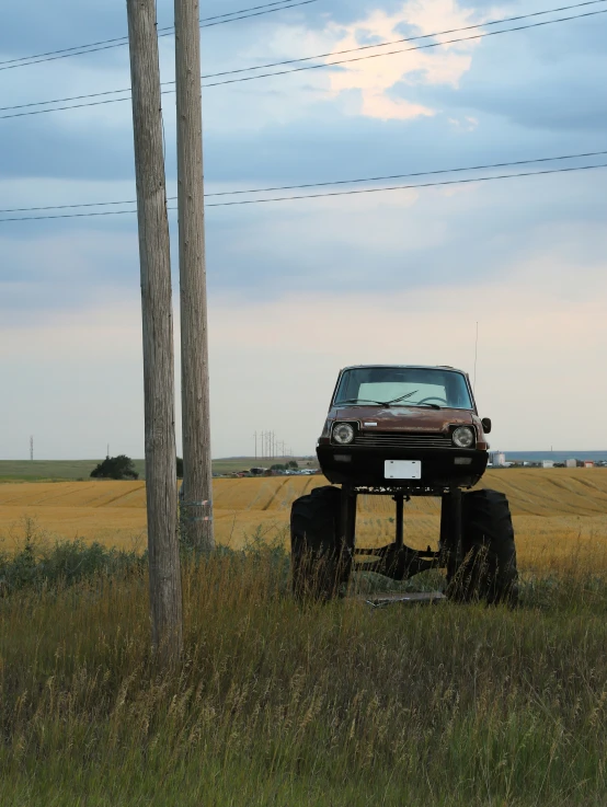 the truck is driving in the field