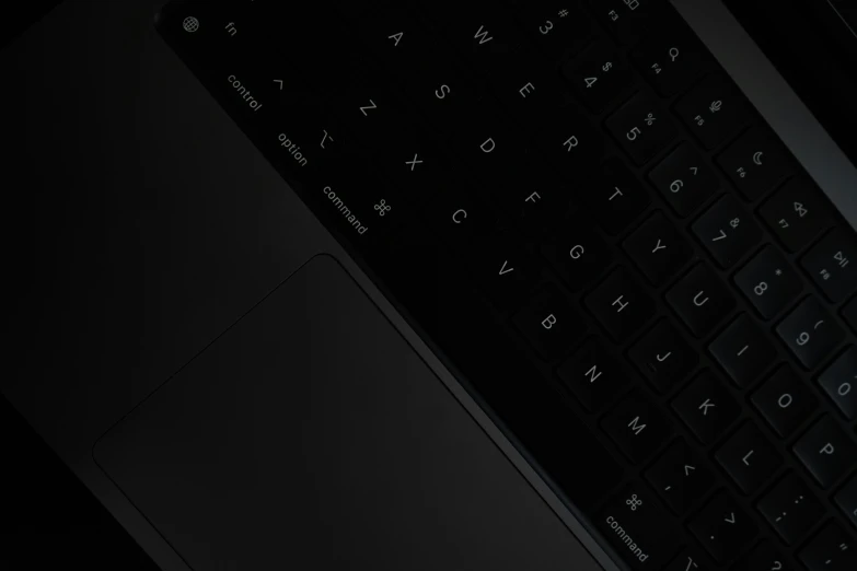 a black keyboard on a laptop computer