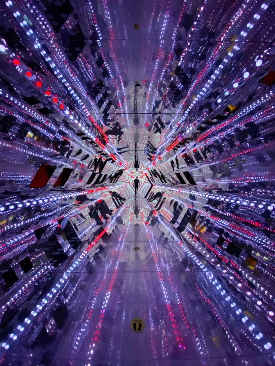 a multi - exposure view of many different lights in a mirror