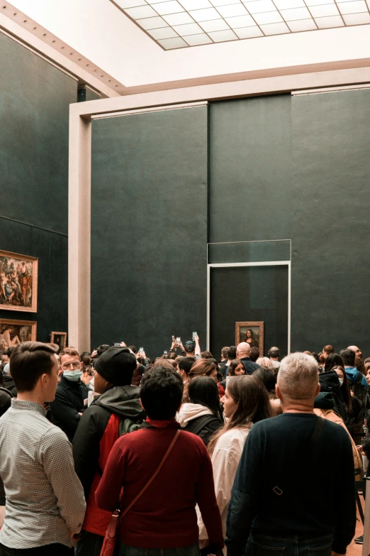 a group of people watching a man and woman