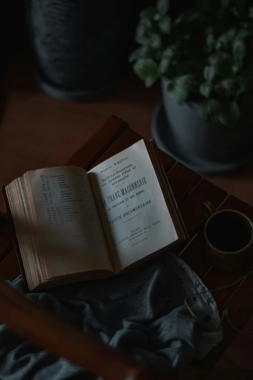 an open book sits on top of a table