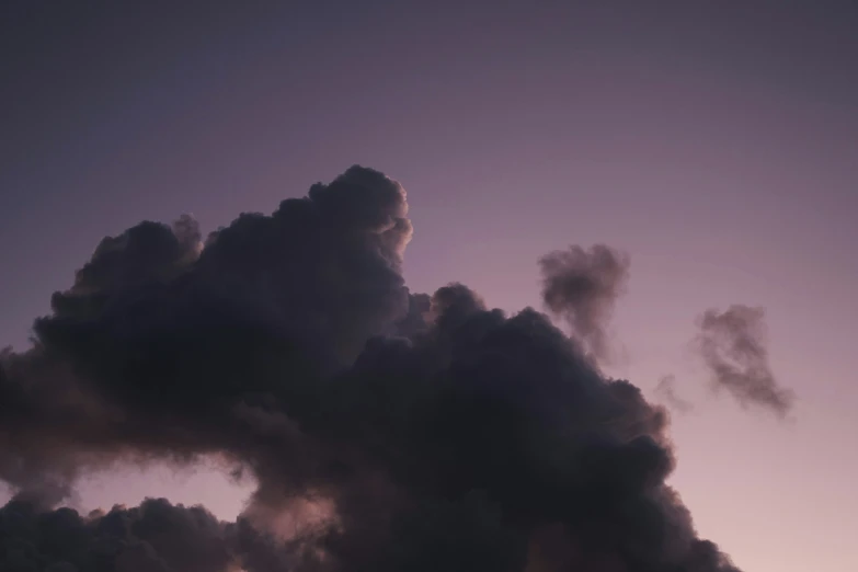 the large, dark smoke billowing from the airplane is very ominous