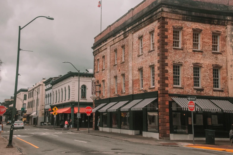 an empty street and building with several buildings