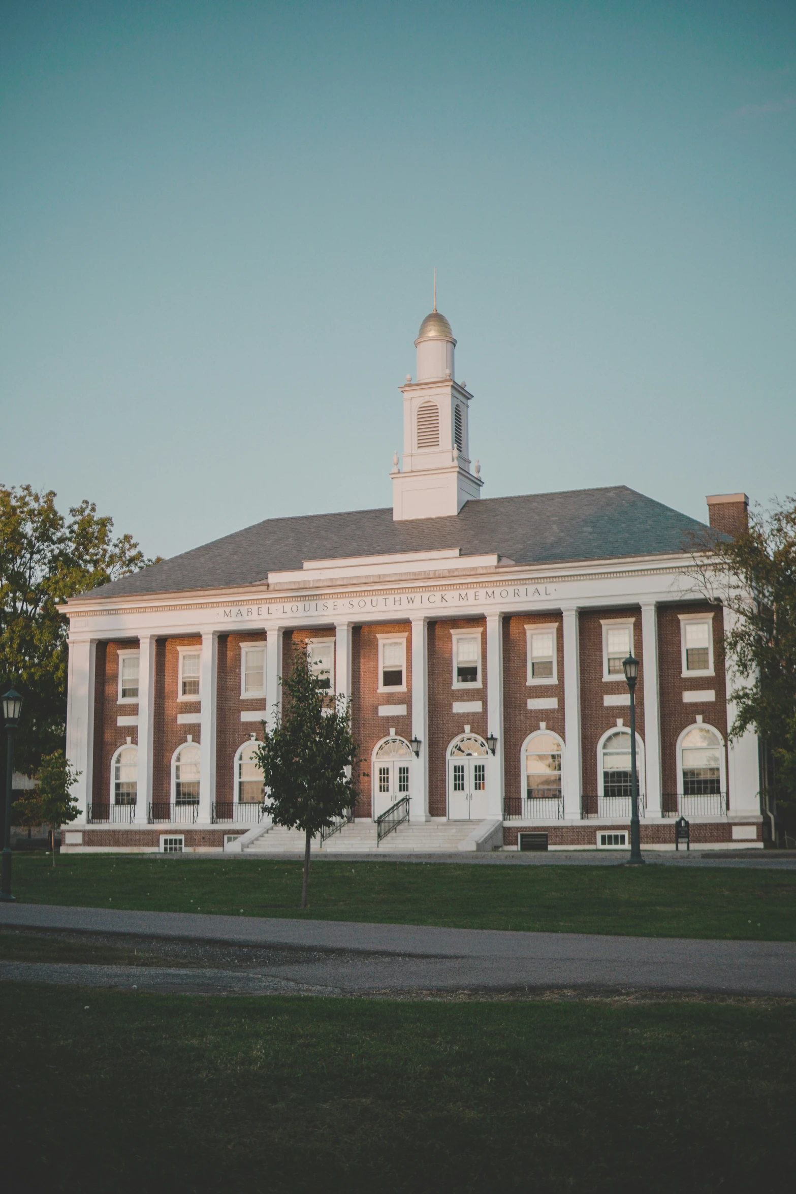 a building with a large tower that has a clock at the top