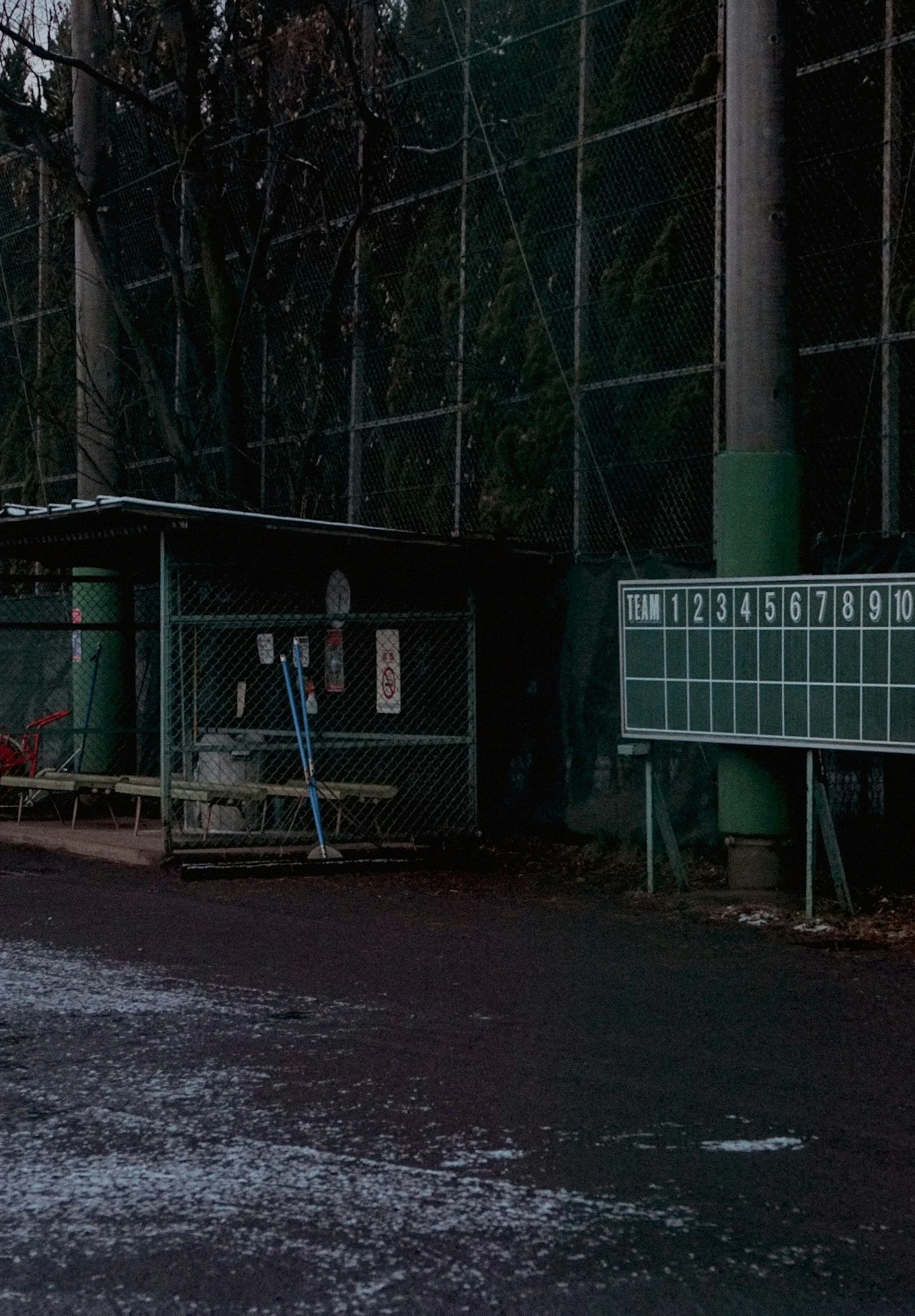 the sign on the fence says, this is where the football game will be played