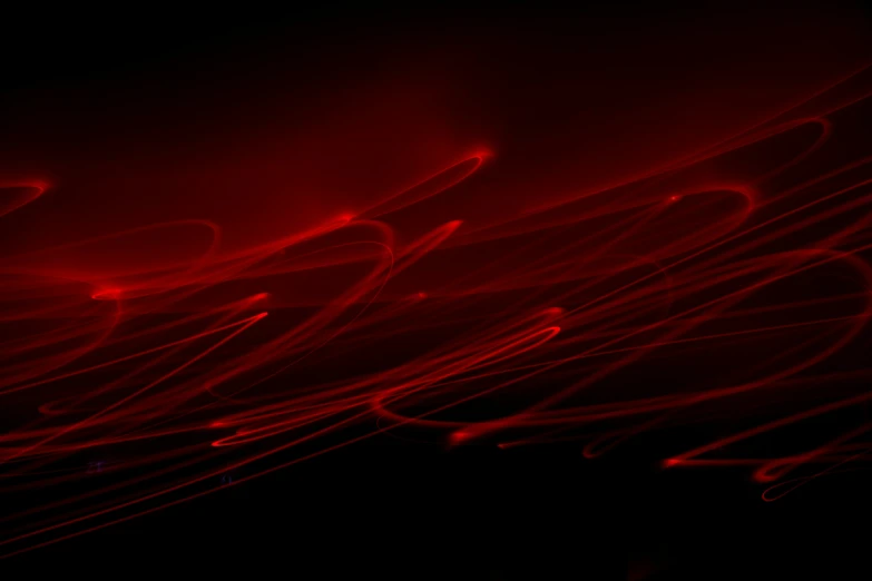 a bunch of light streaks in red