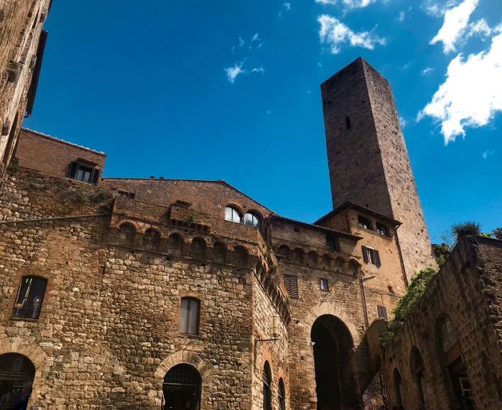 the tall towers in this medieval looking building