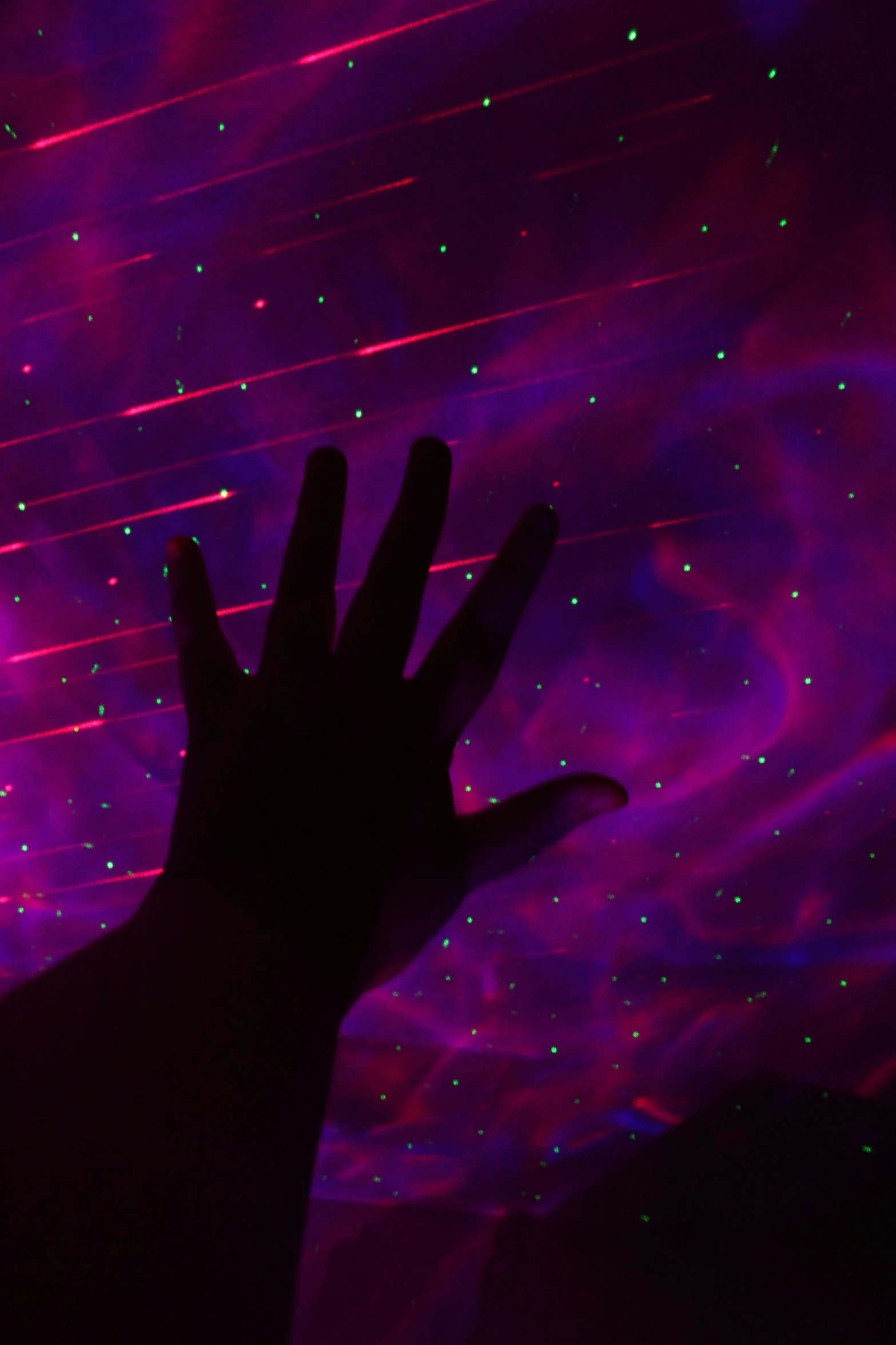 the hand is reaching for stars in the sky