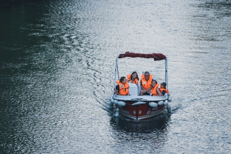 a boat that has some men on it in the water