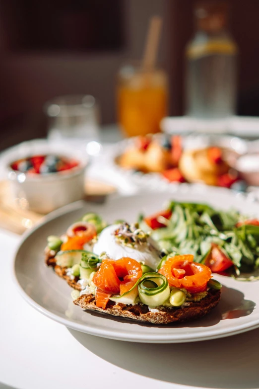 the plate has an open face sandwich on it