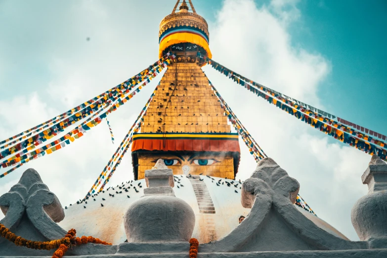 a very tall pagoda with many spires above it