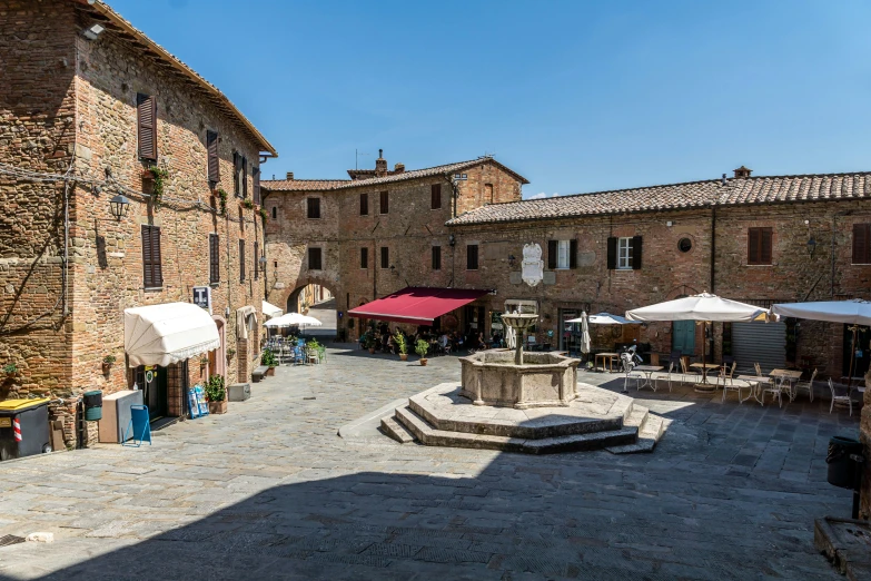 this town has stone streets, umbrellas and vendors