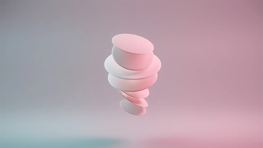 a stack of four pink pills on top of a table