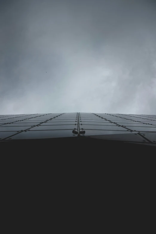 silhouette pograph of umbrellas on top of tiled roof