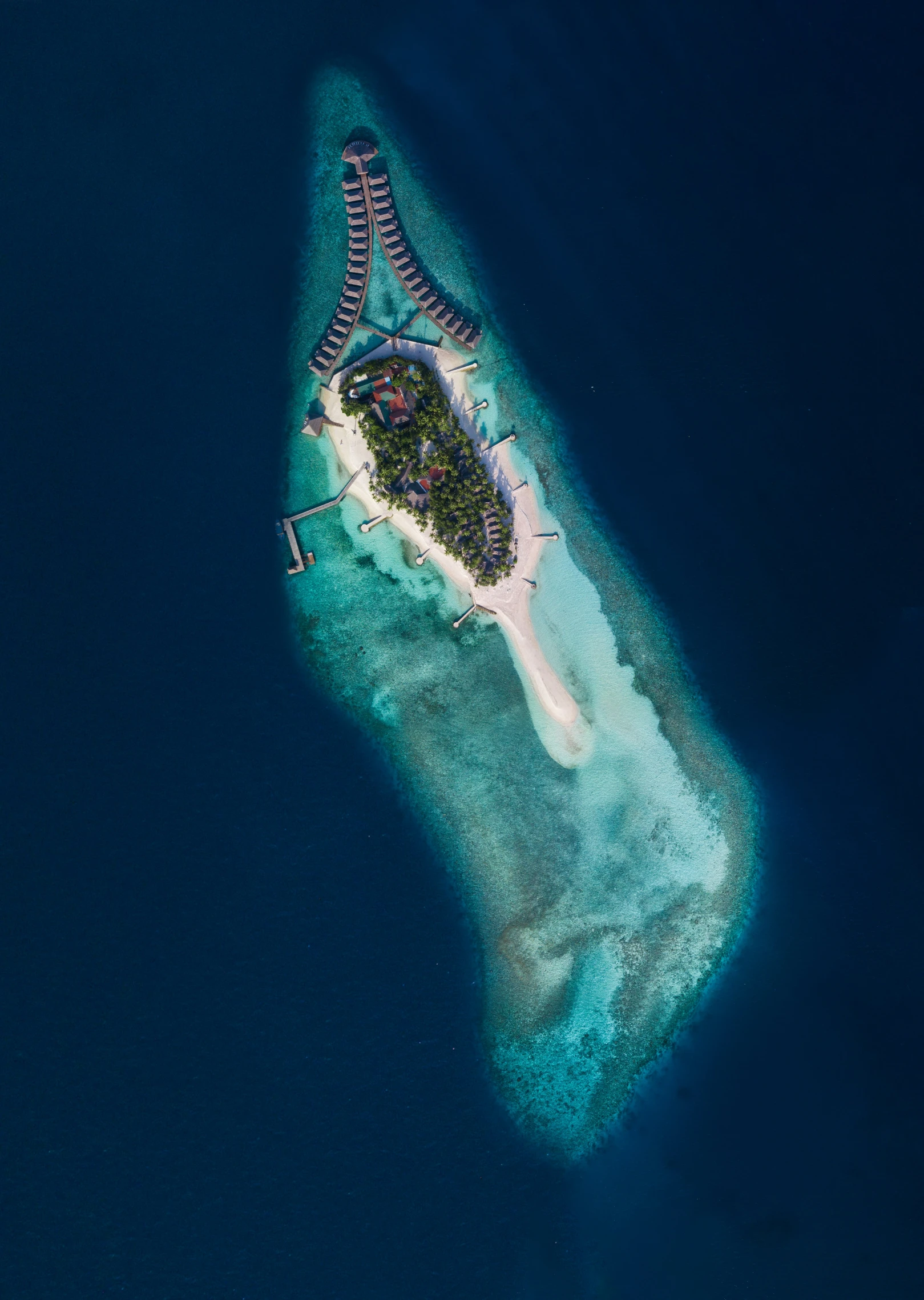 an aerial view of an island in the ocean