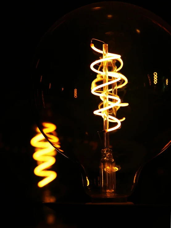 there is a light bulb with a spiral in it