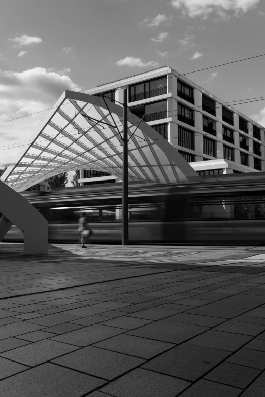 a long exposure of a train passing by some buildings