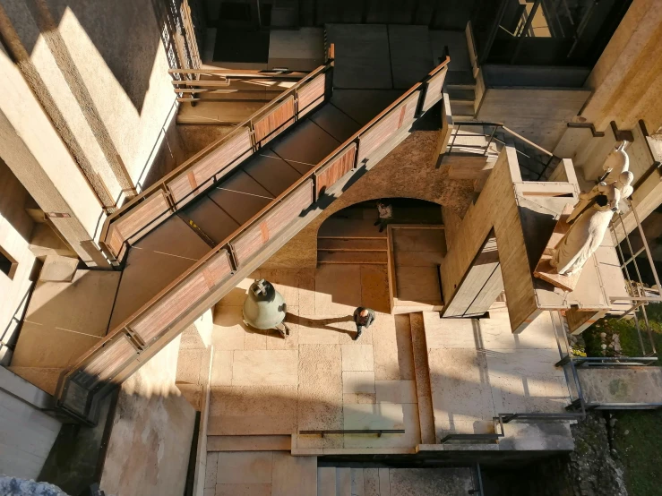 an aerial view of a staircase being constructed in the middle of a building