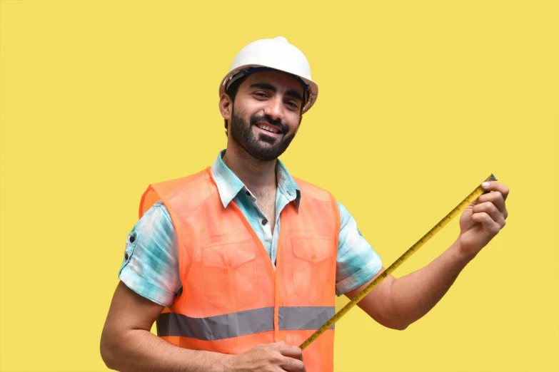 a person wearing a safety vest and holding a stick