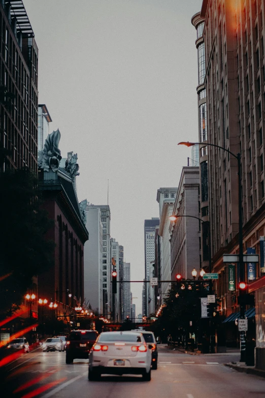 an urban city street with buildings on both sides