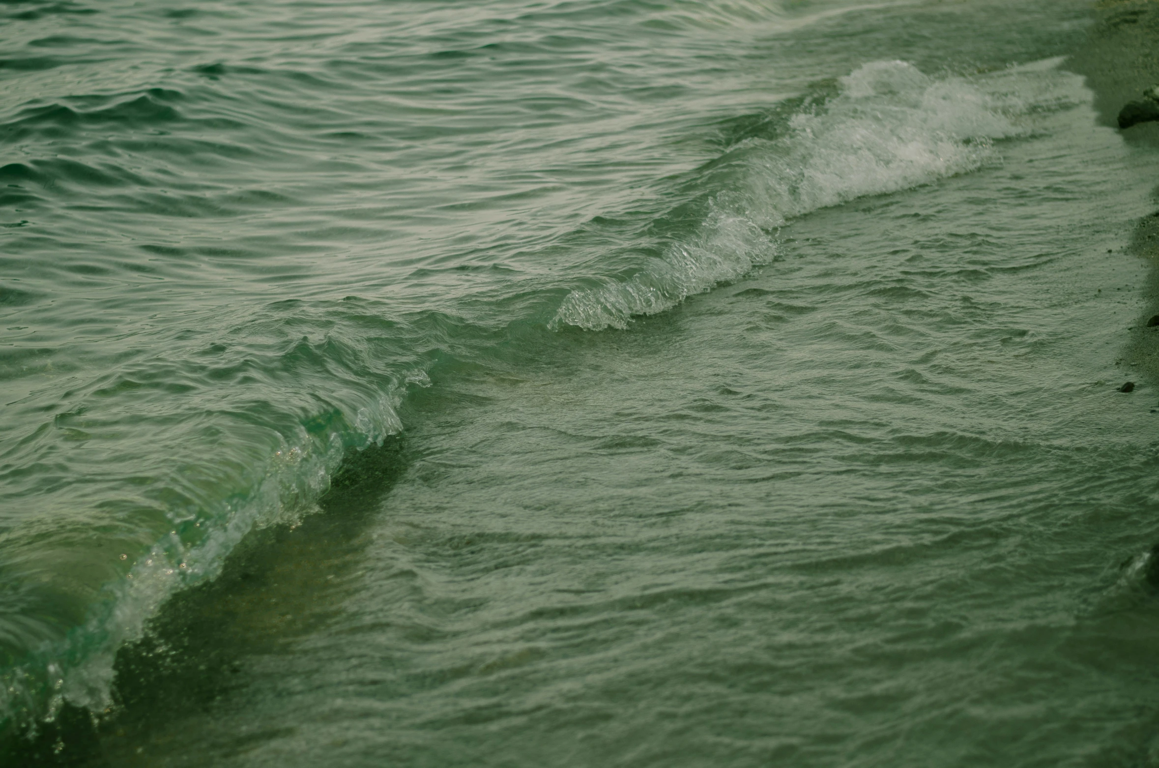 the view from above of some ocean water