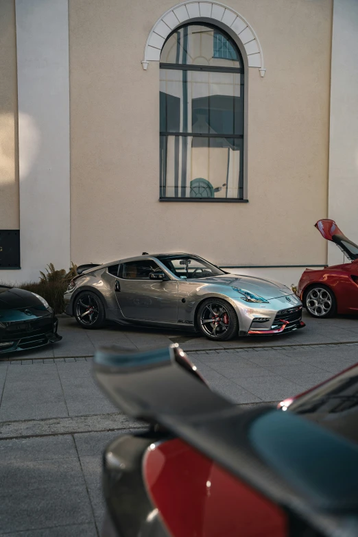 a car parked next to a building on a street