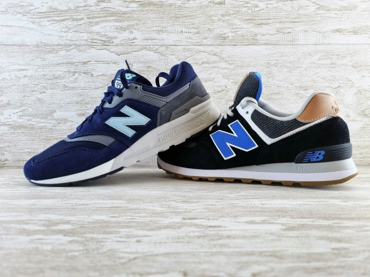 new balance 997 sneaker in black and blue