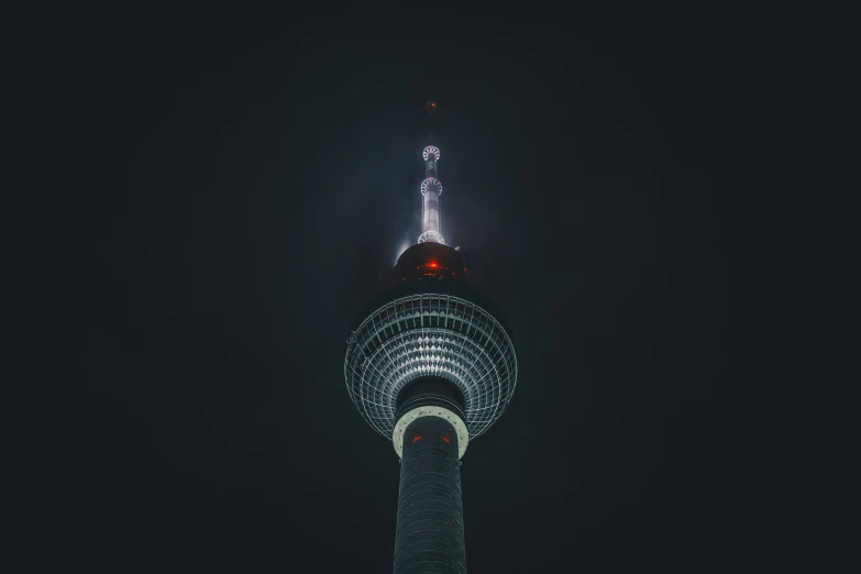 the oriental oriental architecture is illuminated by white and red lights