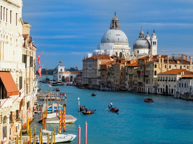 view of a beautiful city next to a canal