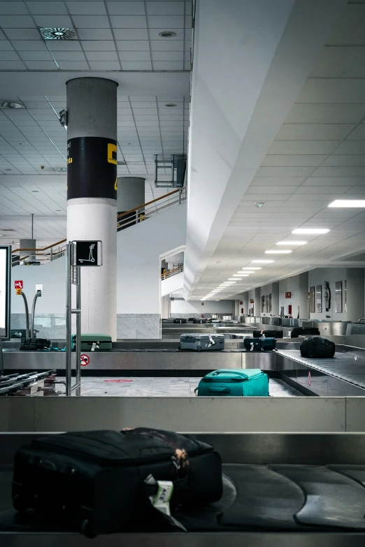 luggage and conveyor belt in an airport