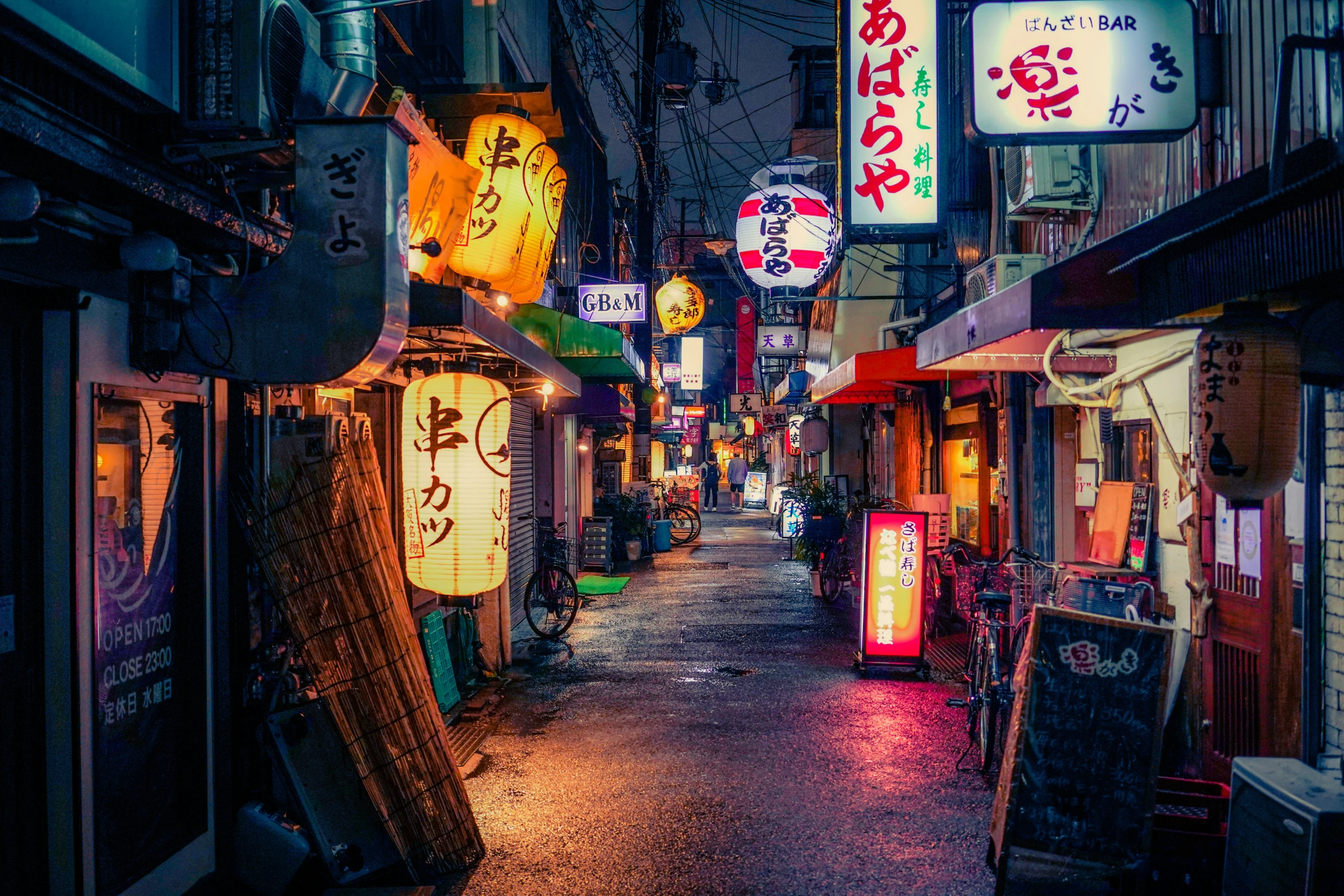 a street filled with lots of shops and signage