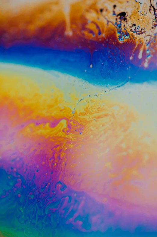 colorful liquid pouring down an apple ipad air