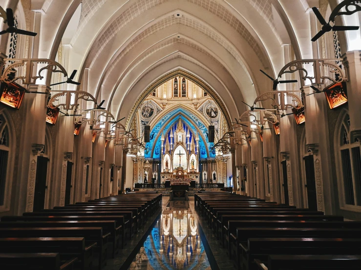 the inside of a church looking toward the alter