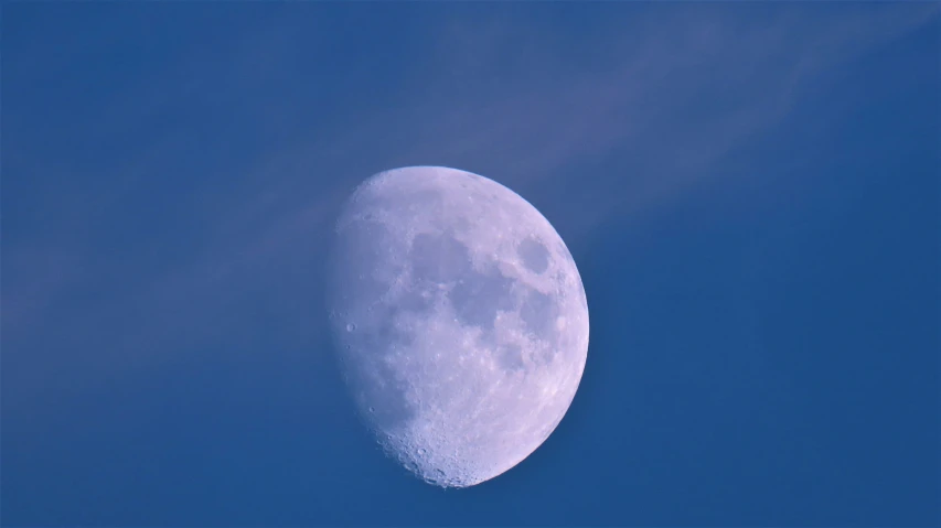 the moon with no clouds in the sky